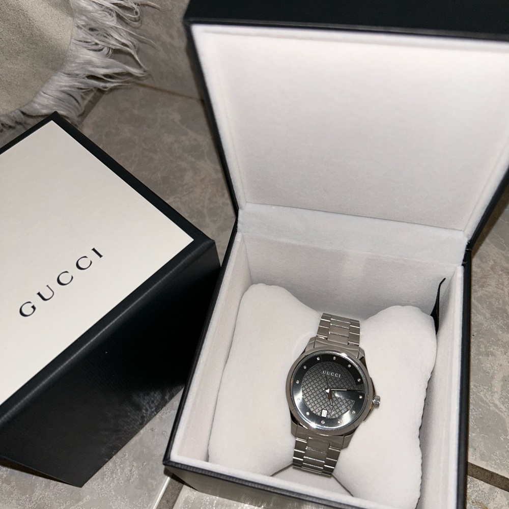 Brand new 12 diamond gucci mens watch never worn comes with box and bag. - Picture 2 of 3